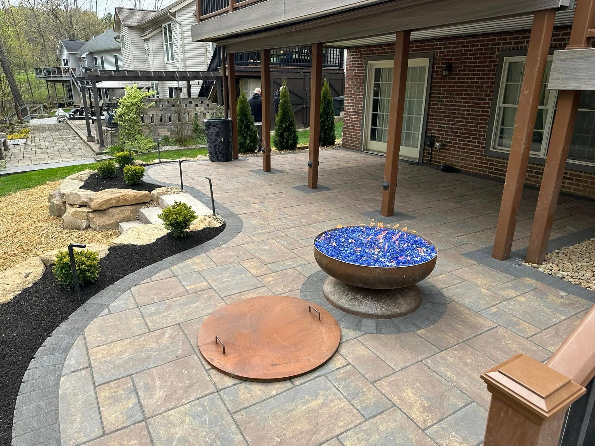 Paver patio with fire pit installed by MY Services LLC